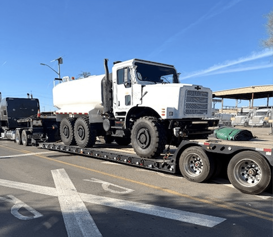 Military tanker transported on semi-trailer